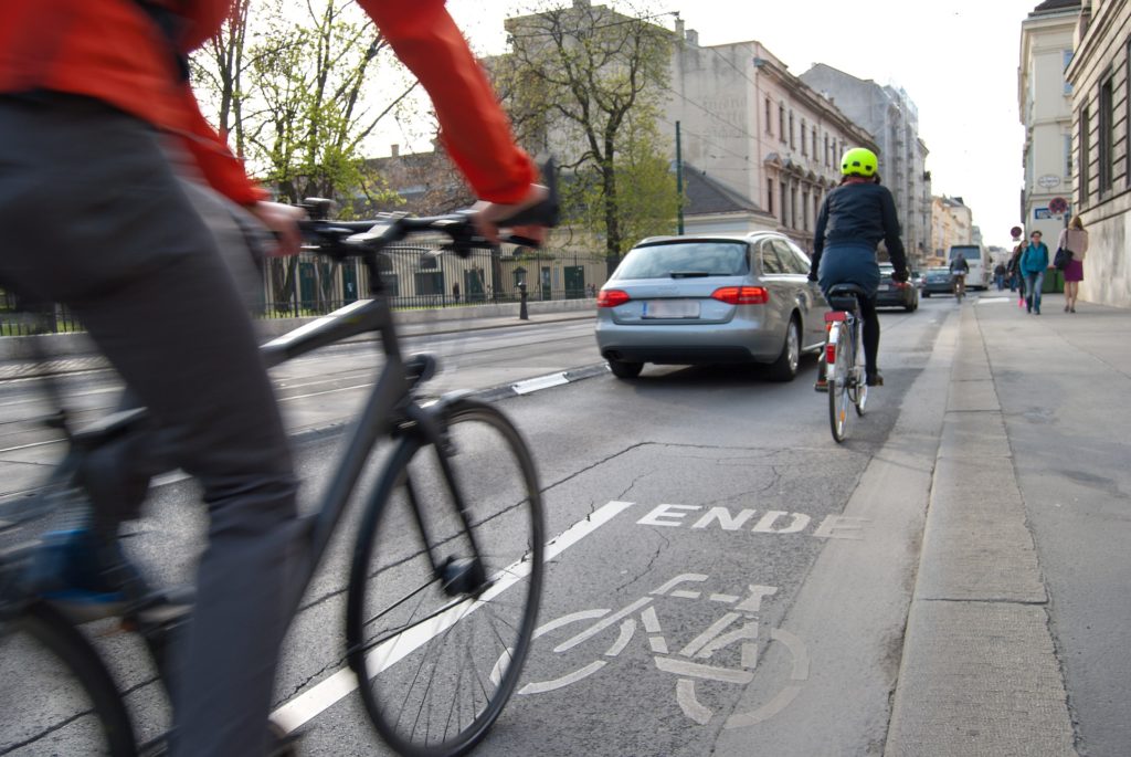 Cyclists using unprotected bike lane